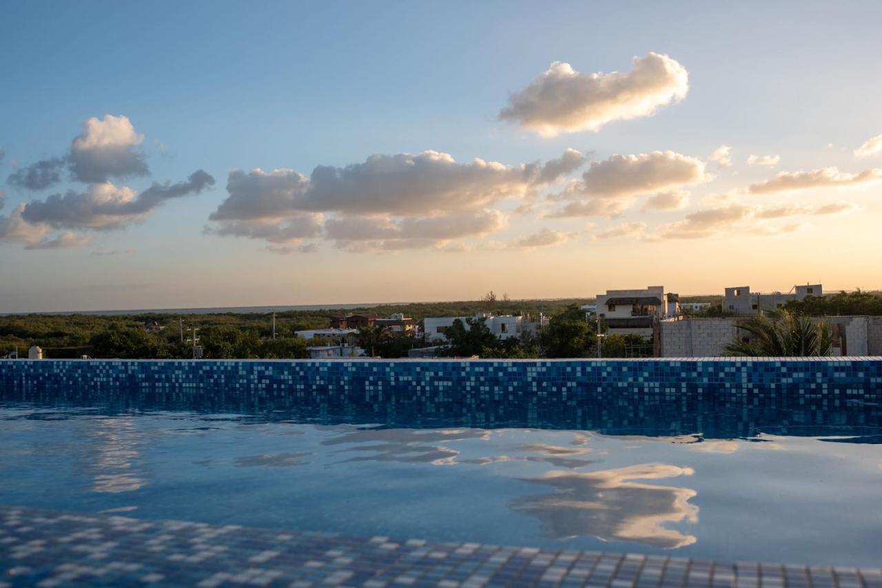 Hotel Mayari Holbox Exterior photo Sunset over Tulum
