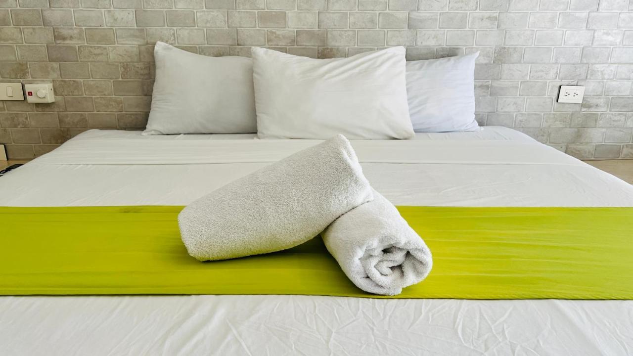 Hotel Mayari Holbox Exterior photo Bath towels on a bed